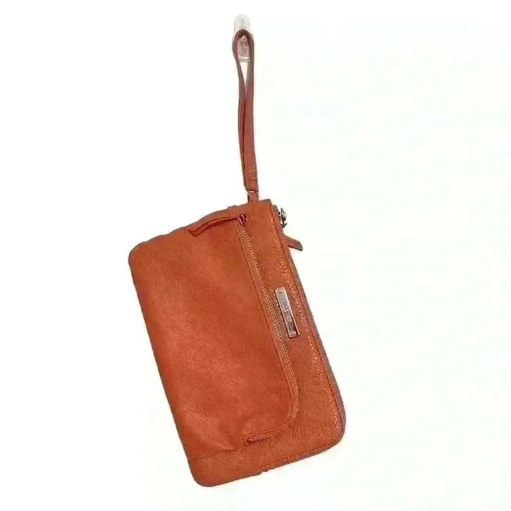Nine West coral wristlet with silver hardware - Picture 1 of 5